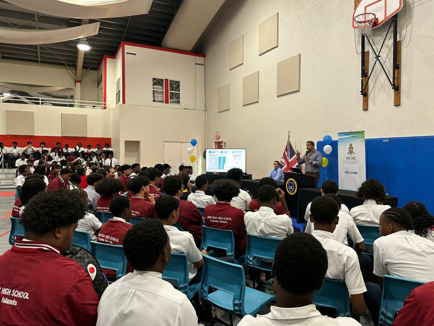 Students heard from Caymanian industry leaders Garth Arch, of Arch and Godfrey, as well as architect Michael Meghoo of architecture firm MJM Design Studio (standing), who spoke at the expo on their work experience and their career success. – Photo: Reshma Ragoonath